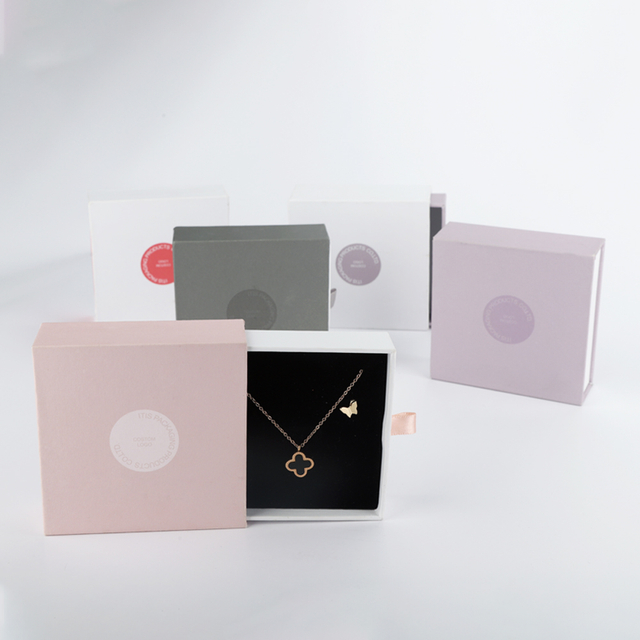 Fábrica de embalaje de cajas de papel de joyería a prueba de polvo personalizada